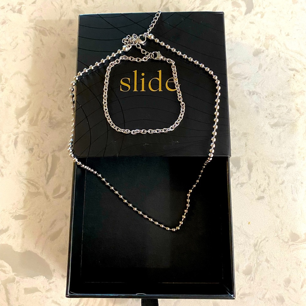 NWOT Slide Jewels silver necklace and bracelet set